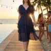 Alege eleganța diafană! Rochie midi albastră din voal, cu volane și mâneci delicate. O ținută vaporoasă, perfectă pentru nuntă sau botez. Livrare rapidă!