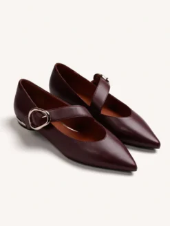 Balerini damă Gioseppo bordo din piele naturală, cu vârf ascuțit, cataramă decorativă, toc metalizat de 1,5 cm și branț căptușit. Descoperă pe MANGATA.
