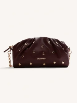 Descoperă geanta crossbody burgundy cu efect texturat și accesorii aurii de la brandul spaniol Gioseppo. Alege un design elegant cu lanț. Cumpără acum!